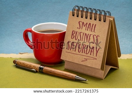 Small Business Saturday note - handwriting in a small desktop calendar, holiday shopping concept Royalty-Free Stock Photo #2217261375
