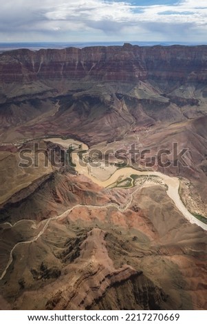 The Grand Canyon, a huge canyon carved out by erosion in red, yellow, brown and orange, where the Colorado River still flows at the bottom, photos taken from a helicopter, Arizona state, USA