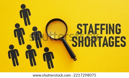 Staffing shortages is shown using a text Royalty-Free Stock Photo #2217298075