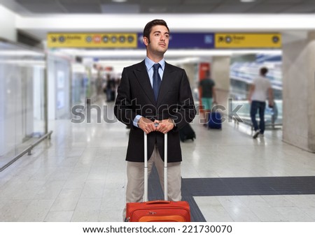 Businessman with trolley bag
