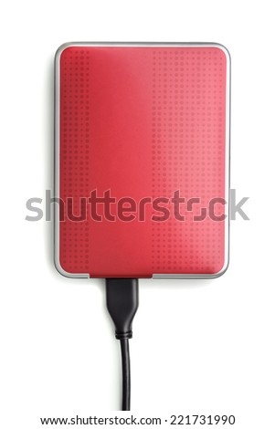 Red external hard disk drive isolated on white
