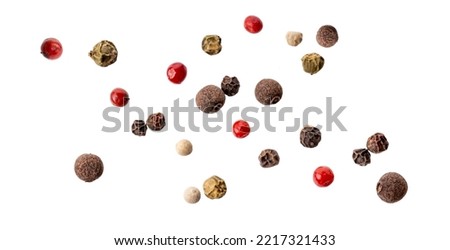 Pepper mix of red, black, white, green and allspice peppercorns isolated on white background. Mixed hot red Pepper. peppercorns on a white background. View from directly above. Royalty-Free Stock Photo #2217321433