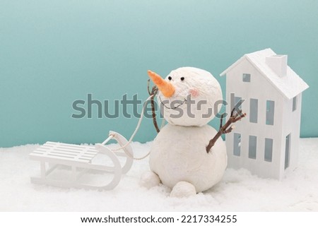 funny  snowman on sleigh christmas background