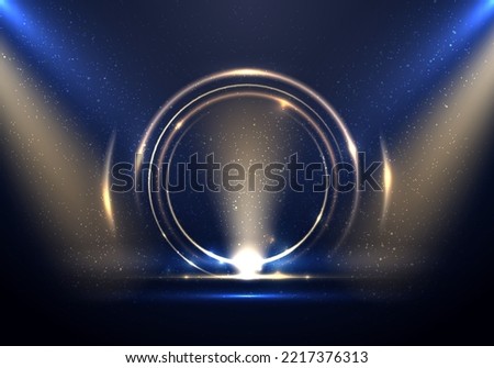 Abstract golden ring circles lighting effect backdrop with spotlight on blue stage background. You can use for celebration award festive, showing, exhibition event, etc. Vector illustration Royalty-Free Stock Photo #2217376313