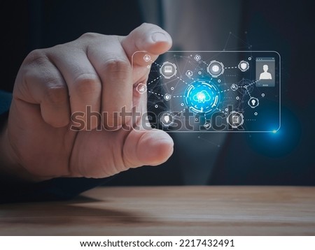Hand of businessman holding digital identification card and technology network and communication with line and business concept.
