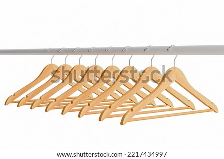 Wood suit hangers on wardrobe bar, wooden clothing hangers isolated on white background. Royalty-Free Stock Photo #2217434997