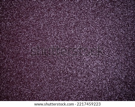 Purple glitter sparkling light background.