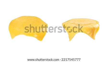 Burger cheese isolated on white background. Flying cheese with shadow. Cheese drips off any round object, mockup. Royalty-Free Stock Photo #2217545777