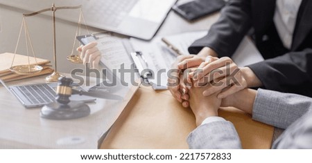 Advocate or lawyer defends accused innocent woman. Legal help and assistance Law concept. Royalty-Free Stock Photo #2217572833