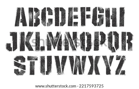 Stencil font with spray paint texture with mis-printed overspray. Highly detailed vector textures taken from high res scans. Compound path and optimised. Original design font Royalty-Free Stock Photo #2217593725