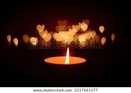 the light of the candle of love that shines Royalty-Free Stock Photo #2217661377