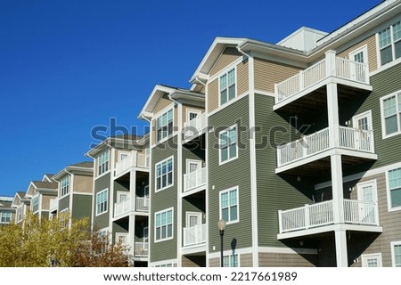 close up on modern rental apartment buildings          Royalty-Free Stock Photo #2217661989