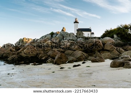 Beautiful sunrise at the lighthouse. Lighthouse France. Lighthouse in ocean 