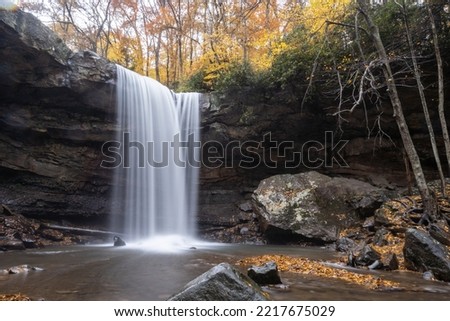 Fall waterfall. Perfect for seasonal pictures and advertisements.