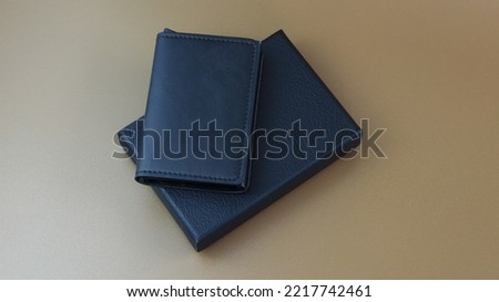 black leather wallet for cards and packaging boxes