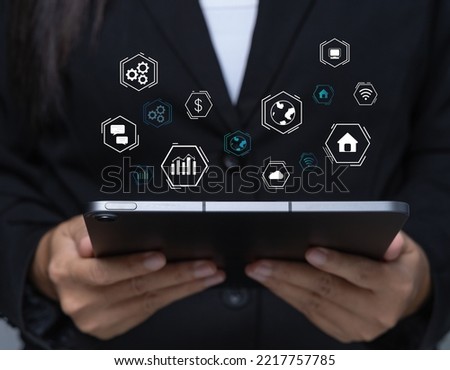 Close-up of a woman holding a digital tablet Searching for information or shopping online, using business technology, communication, networking ideas or remote work, global business network.