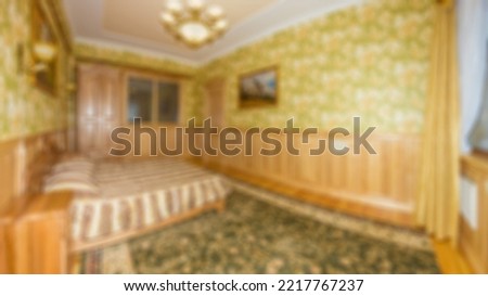 Defocused and blurred photo of luxury and modern bedroom with sea view in hotel apartment interior design. Ideal for background.