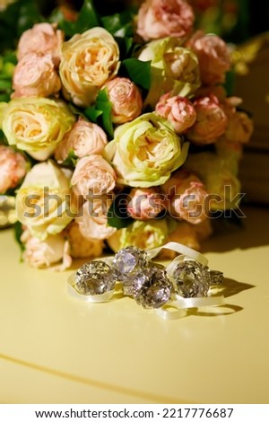 Elegant gifts in the form of wedding rings with diamonds for guests at a wedding or other celebration.