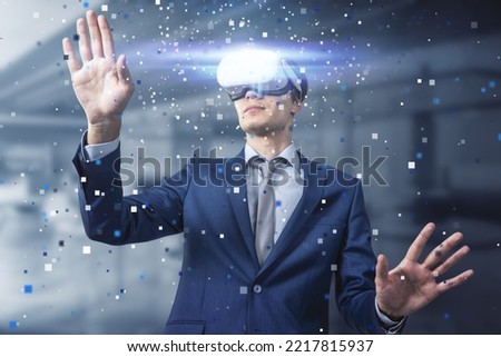 Virtual reality and metaverse world concept with handsome man wearing VR headset for remote work or investing and touching digital pixel screen