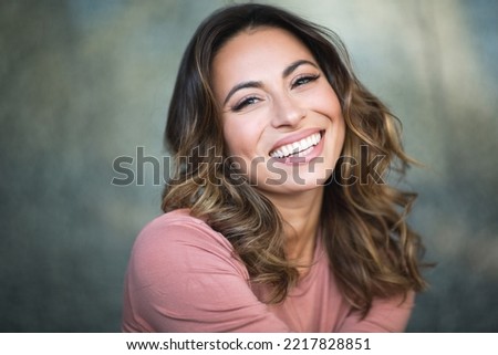 Close up portrait happy laughing young woman 