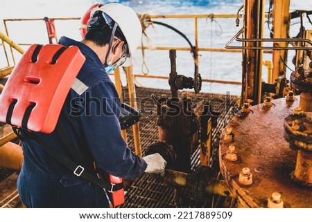 Inspectors inspect pipes severe corrosion the petrochemical industry oil and gas with ultrasonic instruments. Royalty-Free Stock Photo #2217889509