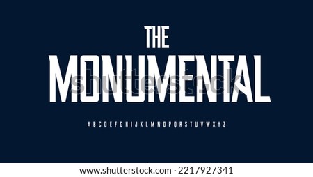 Monumental sport font, high alphabet, condensed bold letters for unique sportswear title and slim slender headline. Grotesk typography with acute angle spike serifs. Vector typeface Royalty-Free Stock Photo #2217927341