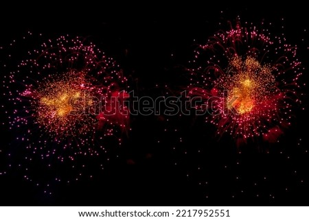 Festive firework background. Fireworks with sparks, colored stars and bright nebula on black night sky universe, comets. Amazing beauty colorful fireworks display on celebration, showing. Copy space