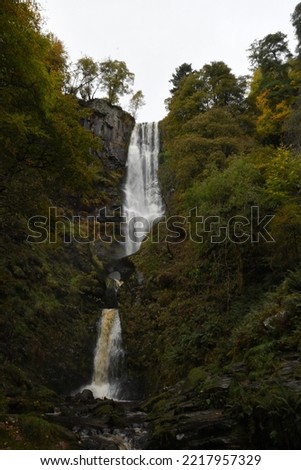 the tall Pistyll Rhaeadr waterfall in north wales from the bottom of it