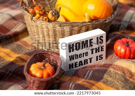 autumn background. pumpkins. Thanksgiving background. Pumpkins for Thanksgiving. Inscription home is where the hearts is