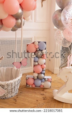 photo zone with birthday balloons. blackboard with empty space for text
