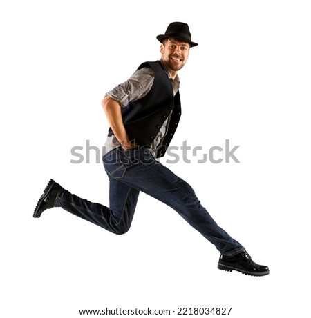 Man with black hat dancing on white background. Contemporary ballet