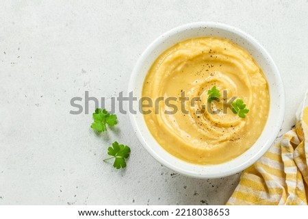 Instant pot split pea puree with herbs and olive oil. Top view, copy space, flat lay. Royalty-Free Stock Photo #2218038653