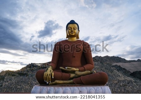  Buddha statue high in the mountains in city of Leh, Ladakh, India