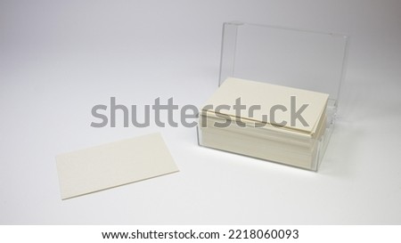 Business Card Exchange. Holding Visiting Or Reference Card. Man, Woman hand holding a blank card isolated on a white background