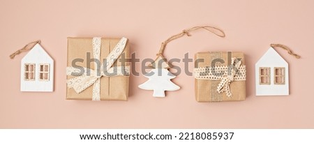Assortment of Scandinavian style, eco friendly, handmade Christmas decoration and gifts on pink background, sustainable xmas idea. Flat lay, top view 