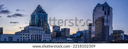 Group of buildings visible from Phillips Square in Montreal.