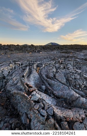 Twilight alpenglow over Blue Dragon Lava Flow, Craters of the Moon National Monument
