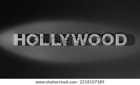 Hollywood  - Single word by moulded letters, old movie style. Black and white photograph Royalty-Free Stock Photo #2218107389