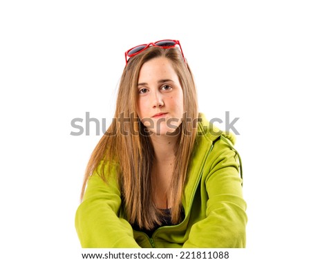 Blonde girl with skate over white background