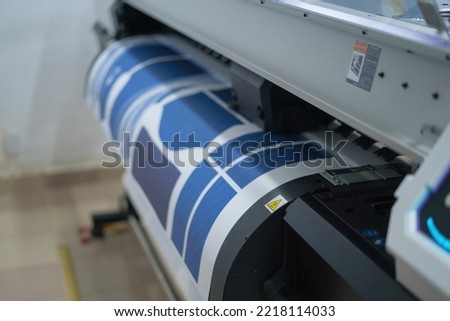 Interior factory Large printing machine for paper business in printing room. Sublimation concept.