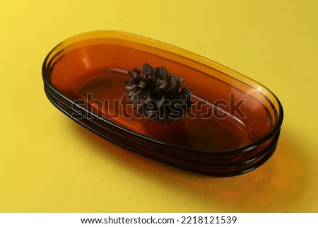 Oval bowls made of glass are arranged on the table. Selective focus