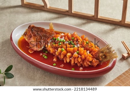 Song Shu fish or Squirrel Mandarin Fish, belongs to Huaiyang cuisine. The dish is named Squirrel Fish because of the way the dish is presented and resembles the fluffy tail of a squirrel.