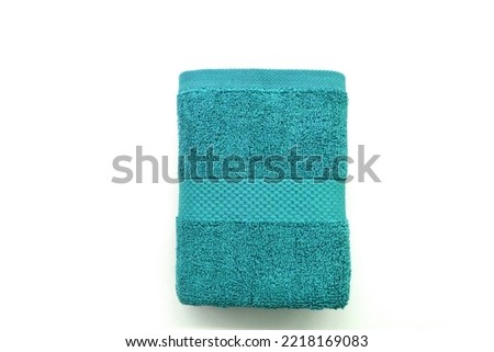Turquoise Bath Towel 100% Cotton Terry Bath Hand Towel Isolated with White Background Royalty-Free Stock Photo #2218169083