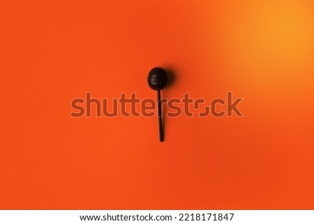 Image of a black halloween lollipops