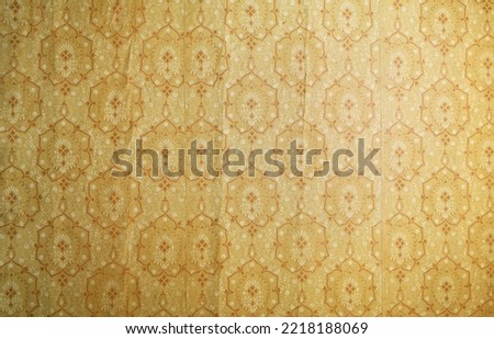 Old wallpaper on the wall. Old wallpaper for texture or background. Royalty-Free Stock Photo #2218188069