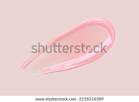 cosmetic smear of balm mask gel on beige background Royalty-Free Stock Photo #2218216389