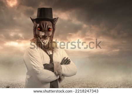 A werewolf on the field with dramatic scene background. Halloween concept