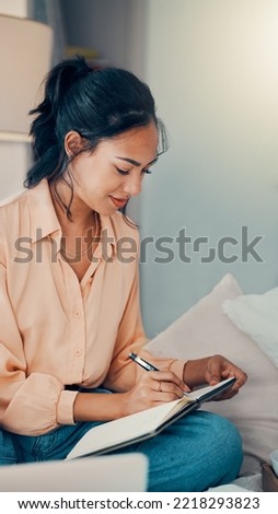 Planning, notebook and woman in bedroom writing to to list or ideas in journal in home. Creative idea, inspiration and happy girl with book on bed taking notes for work or life goal in personal diary