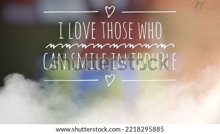 Inspirational motivation quote in bokeh background. i love those who can smile in trouble