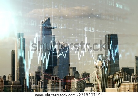 Double exposure of abstract creative financial chart hologram on New York skyscrapers background, research and strategy concept